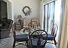 Glass enclosed balcony. Living room is open to balcony.  Can open or close sliding glass doors on rail.
