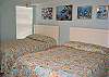 Bedroom 2. Has entrance to balcony.