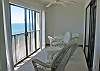 Glass enclosed balcony. Can open or close sliding glass doors on rail.