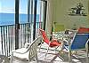Glass enclosed balcony. Can open or close sliding glass doors on rail.