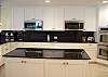 Partial view of kitchen area.