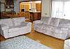 Two new couches were recently added to the living room.