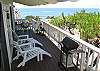 Step outdoors to nap on the comfy beach chairs.  Just outside the kitchen, you'll find the gas barbecue.