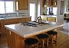 You can see the door to the deck going out to the west-facing deck.  The kitchen and living space is on the upper level, to take advantage of the height and amazing ocean views.