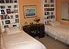 This warm and cheery bedroom is downstairs.