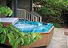 This huge  hot tub is off the back porch.