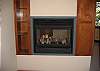 There is a double-sided fireplace in the Master Bedroom.  Just off to the right, but still inside the bedroom, there is also a sitting room.