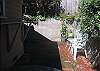 This is an enclosed area in the back of the house where the pets can safely relax.