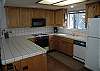 This open kitchen flows nicely making entertaining easier.  The kitchen is part of the open floorplan in the home, so that you will never miss a bit of conversation.