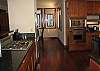 Spacious gourmet kitchen that looks out on to the great room and the beautiful ocean view.