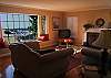 The living room has awesome views of Pirate's Cove, across the Fiscalini Ranch.  Hardwood floors and a new TV have recently been added.