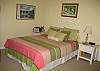 The second bedroom has a comfortable queen size bed and soft natural light that is perfect for optimal relaxation.