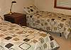 This room has a pair of twin beds.  Perfect for your little ones.  This bedroom is on the middle level, and shares a full bathroom with heated tile floors and heated towel racks.