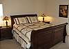 There is a beautiful sleigh bed in the second bedroom.  It also has a nice TV with cable.