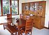 The dining room looks out to the ocean, and can comfortably seat up to eight. You can also pick up an internet signal while seated at the far right corner of this table.