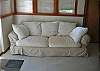 Comfortable couch to sit back on and enjoy your favorite book.
