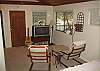 Enjoy some quiet time in this comfortable sitting area in the master bedroom. There is a 30-inch flat screen TV for watching your favorite show or DVD.