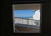 Enjoy the sight and sound of the crashing waves from your living room.
