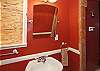 Beautiful red bathroom with shower