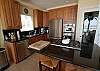 Top of the line appliances in the kitchen, with granite countertops