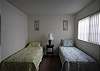 Two twin beds with double closet