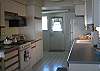 So clean it twinkles! Complimented by modern appliances, smooth countertops and built-in desk.