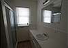 Roomy shower and plenty of storage space.