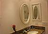 Hall bathroom with granite countertop