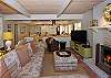 Living area with fireplace and flat panel TV