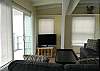 Invite the outdoors in with large sliding doors. Afternoon breezes will keep you cool.