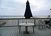 Large patio features grand views, BBQ, table and chairs