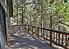 Large Deck Surrounded by Trees