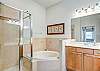 Master Bath With Soaking Tub And Step-In Shower