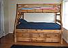 2nd Floor:  Bedroom 1 has a double-twin bunk bed with a trundle-bed in pull-out drawer below.