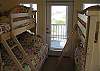 2nd Level:  Just off of the kitchen is the Bunk Room, featuring a Double/Twin Bunk bed and a Twin/Twin Bunk bed (accommodating up to 5 kids).  The Bunk Room, located on the St. Joseph Bay-side of Dune Fine, opens to the large 2nd level wrap-around deck.