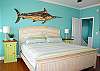 Located on the 3rd Level (Top), the Master Bedroom features a King-size bed, TV, private bathroom, and private deck access