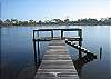 This is the community dock (privately shared by three other homes) leading out to St. Joseph Bay.