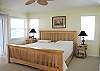 King size bed on the second floor of the house.