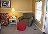 Club chair and ottoman in the living area
