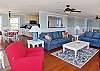 The blue couch is a sleeper sofa.