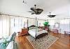 Master bedroom suite overlooking Gulf with private entrance to the upper level deck