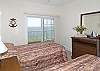 Interior of second bedroom.  View/balcony may change depending on unit location.