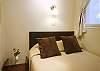 In the bedroom, you receive plenty of light from the back window of the apartment, but no vis a vis to another apartment - You can find complete privacy and peace in this room.
