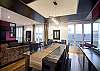 The Dining Area can host up to 10 guests with chairs.  There is a buffet just behind the table to make serving easy.  (No worries about kids making unpleasant banging on a glass table - yikes!)