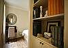 a Desk by the window on the left awaits you along with a queen size bed in the master bedroom.