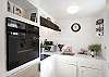 Make practical use of a smaller space with fully equipped oven, stove, microwave and refrigerator