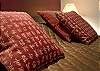 Details of the quality of the sheets and linens in the bedroom.  800 thread count sheets. A Change of fresh sheets can be provided during the stay with the Premium Service Upgrade.