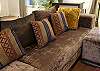 The sofa is at the middle of the room ideally situated for social gatherings or for relaxing in front of the large screen LCD TV. 1 adult guest or 2 children can comfortably sleep on the sofa for a max property occupancy of 4 guests. (note the sofa does not fold out)