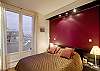 Bedroom has a US double size bed, with lots of closet space. You also have access to the terrace directly.  The bathroom is just beyond the bedroom and others can access the bathroom without disturbing those in the bedroom.