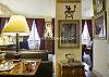 Beautiful paintings, palatial furnishings and  all the right details.